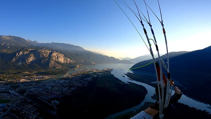 POV paragliding at sunset